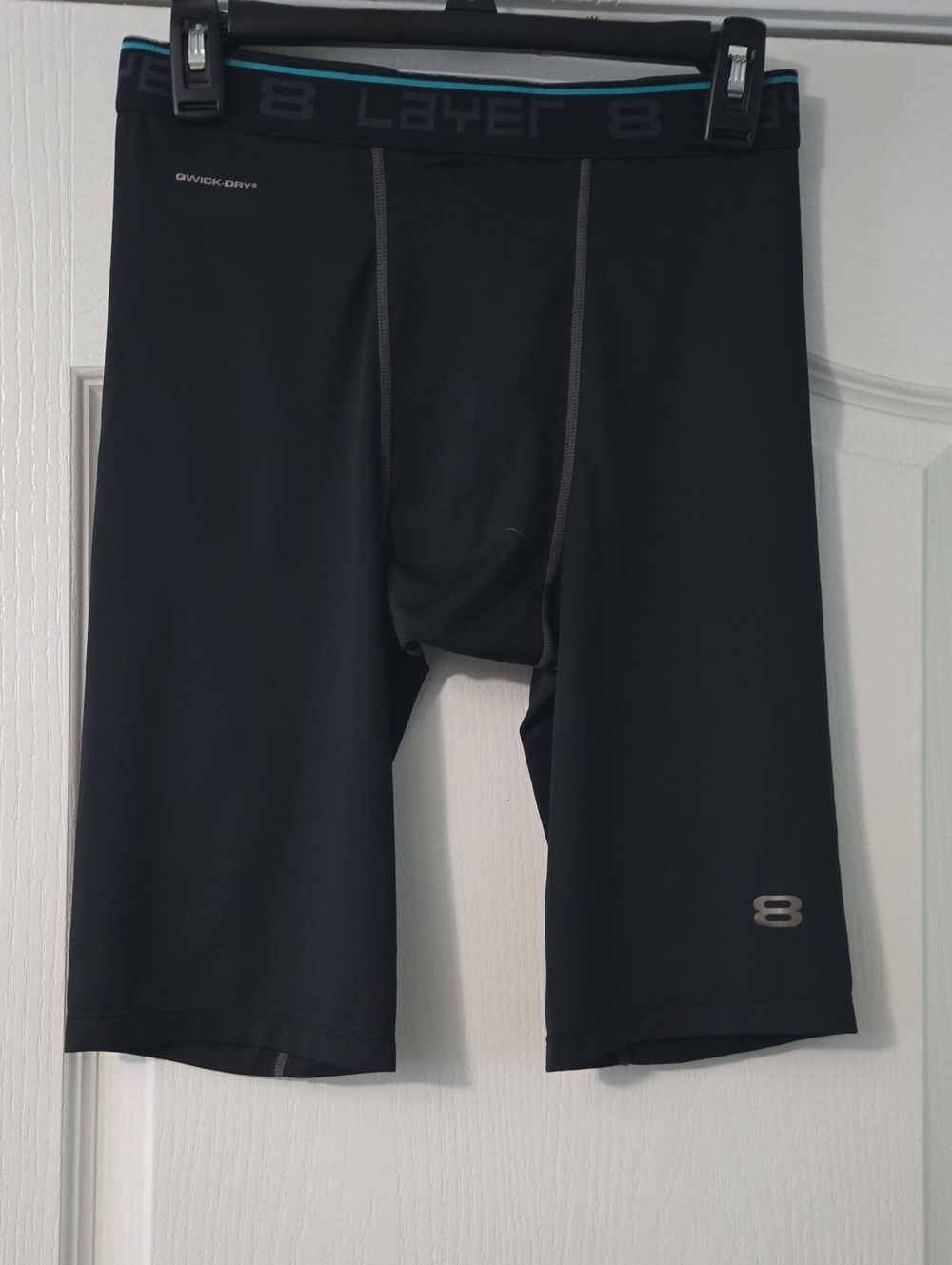 Layer 8 Black Athletic Compression Shorts with Teal Waistband Trim